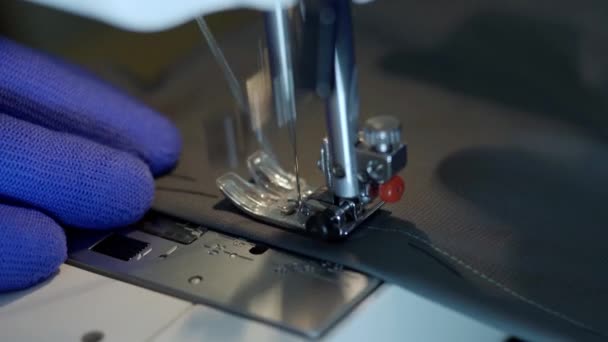 Close-up of sewing machine needle rapidly moves up and down. — Stock Video