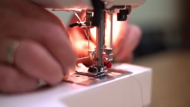 Close-up of sewing machine needle rapidly moves up and down. — Stock Video