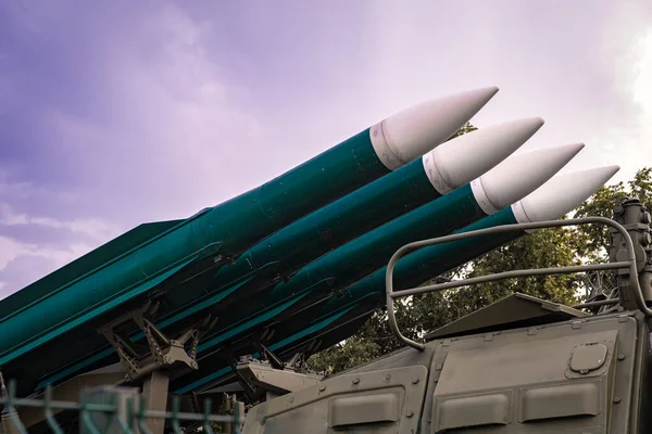 Missiles ready to launch, weapons of mass destruction, preparation for war and fight against terrorism against the blue of the peaceful sky — Stock Photo, Image