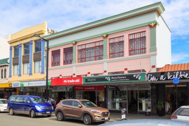 Colorful 1930s Art Deco buildings in Napier, New Zealand. The Bennett's and Blythe's Building on Hastings Street. Photographed March 23 2018  clipart