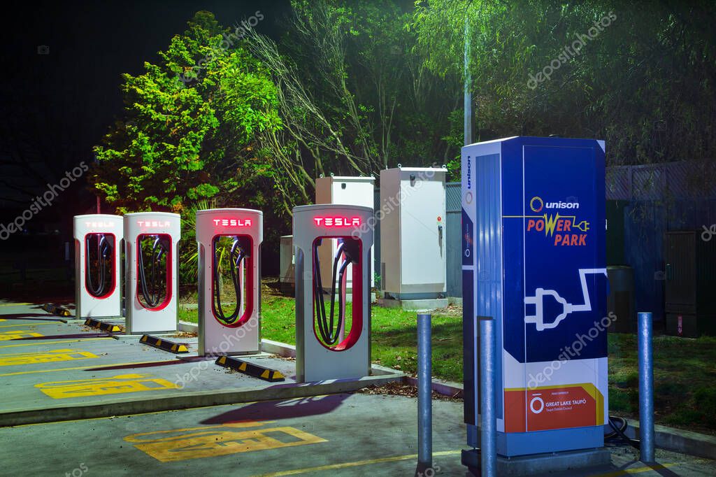 An electric vehicle charging station in Taupo, New Zealand, photographed at night. May 21 2020
