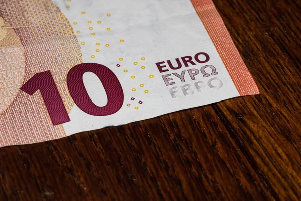 Detail on 10 euro banknote. Close up of banknote laid out on tab — Stock Photo, Image