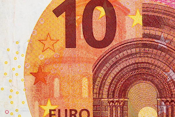 Detalhe do euro em cima da mesa. Macro shot, close up foto de eur — Fotografia de Stock