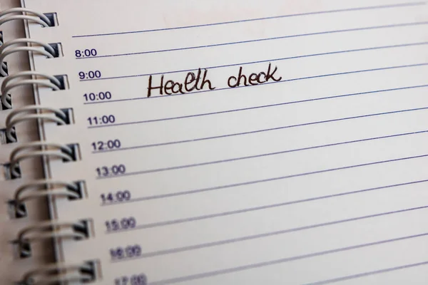 Text Health Check on personal agenda. Writing Health check on of