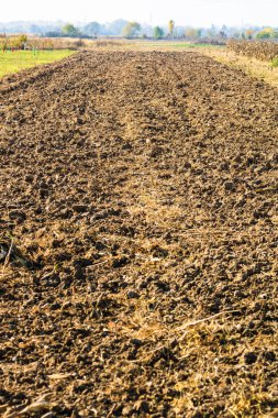 Sürtünmüş toprak dokusu. Tarla ekime ve tarıma hazır.