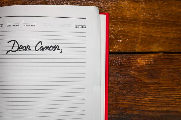 Kära Cancer, handstilstext på sidan med personlig agenda. Brev — Stockfoto