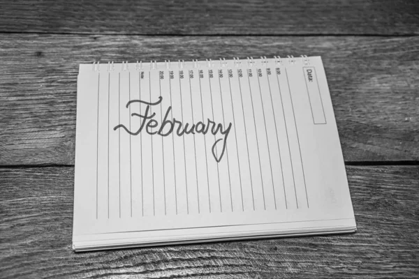 February, writing love text on paper, lovely message. Text on sp