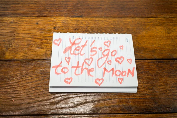 Lećmy na księżyc, pisząc miłosny tekst na papierze, urocza wiadomość — Zdjęcie stockowe