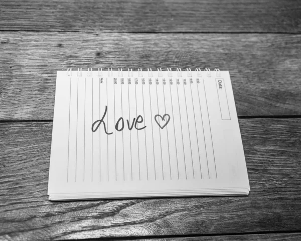 Love, writing love text on paper, lovely message. Text on spiral — 스톡 사진