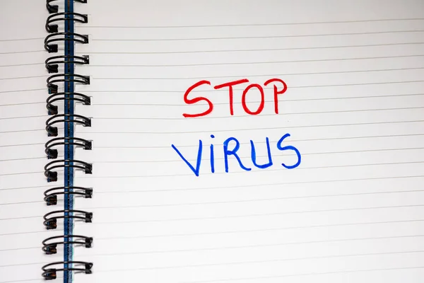 Pare de escrever textos de vírus no papel, na agenda do escritório. Copiar sp — Fotografia de Stock