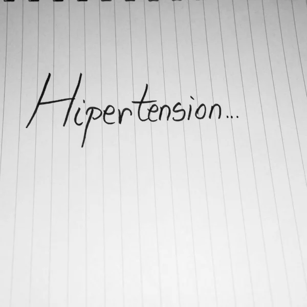 Hipertension handwriting  text on paper, on office agenda. Copy — Stok fotoğraf