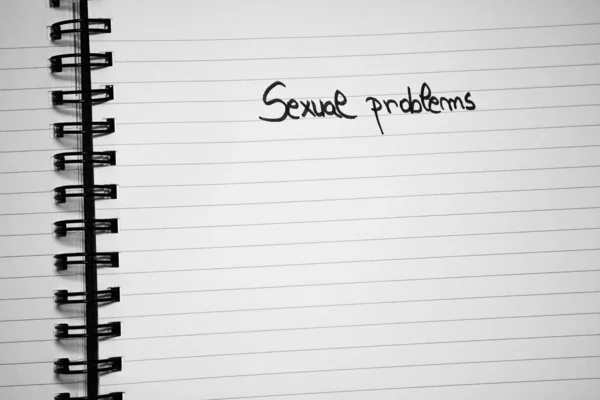 Problèmes sexuels écriture manuscrite texte sur papier, à l'ordre du jour du bureau. Co — Photo