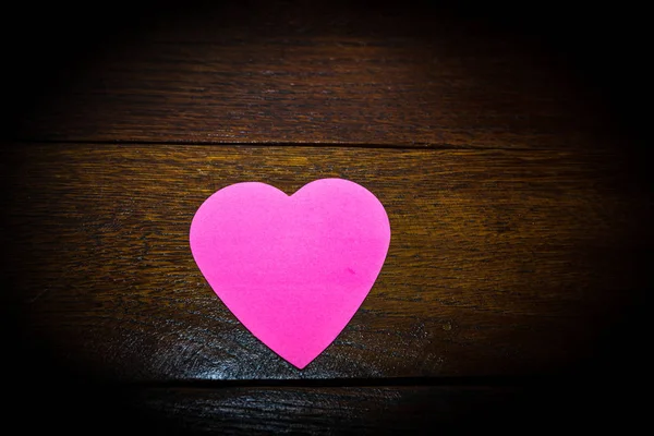 Heart shaped paper cut out on table, love message and Valentine` — Zdjęcie stockowe