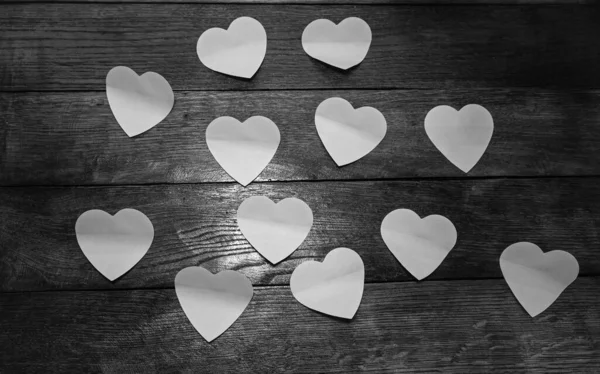 Heart shaped paper cut out on table, love message and Valentine` — Stok fotoğraf