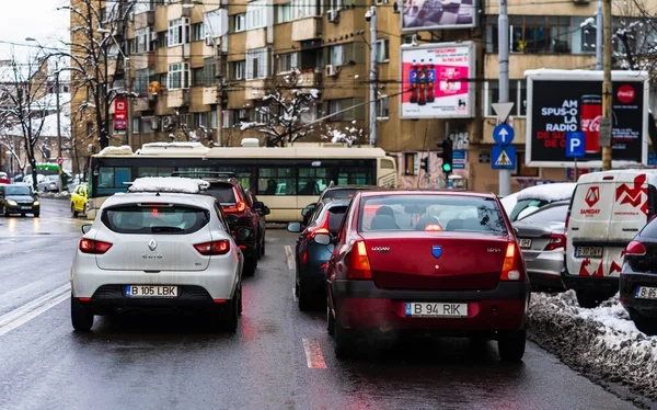 Winter season and icy cars on the road in the morning rush hour — Stock Photo, Image