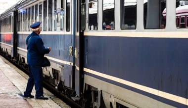 Train crew doing the last checking on the platform at the Buchar