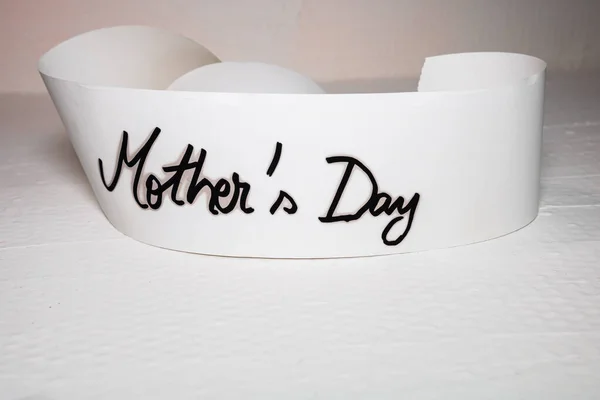 Mother`s day writing love text for mother on paper. Label tag wi