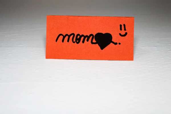 Mom writing love text for mother on paper. Label tag with lovely — Stockfoto