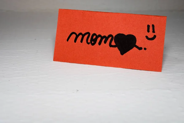 Mom writing love text for mother on paper. Label tag with lovely — Stock Photo, Image