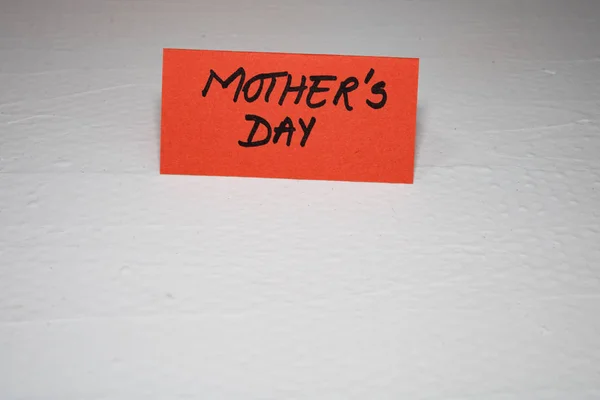 Mother`s day writing love text for mother on paper. Label tag wi