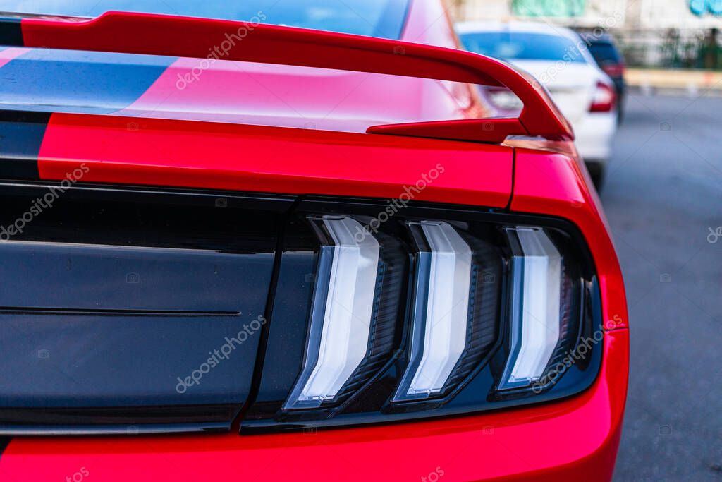 Details of modern car Ford Mustang GT. Backlights of car modern luxury technology and auto detail. Bucharest, Romania, 2020.
