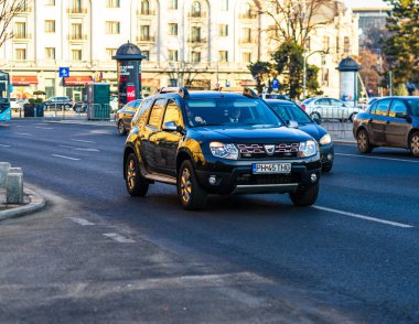 Dacia Duster in traffic of downtown Bucharest, Romania, 2020. clipart