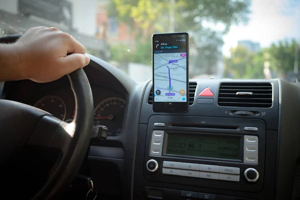 Car Dashboard View Smartphone Showing Waze Maps Show Way City — стоковое фото