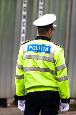 Romanya Polisi (Politia Rutiera), Romanya 'nın başkenti Bükreş' te 2020 yılında Coronavirus COVID-19 'un yayılması üzerine sokağa çıkma yasağı ihlallerini önlemek için trafik ve devriye gezen caddeleri yönetiyor.