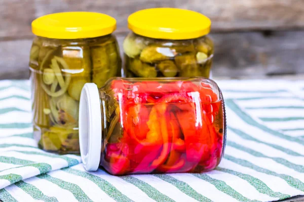 Glass Jars Pickled Red Bell Peppers Pickled Cucumbers Pickles Isolated — Stock Photo, Image