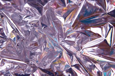 Parlak efektli buruşuk gökkuşağı ambalaj kağıdı. Kapat..