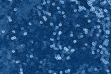 Pullu parlak kumaş, soyut arkaplan tonlu mavi renk.