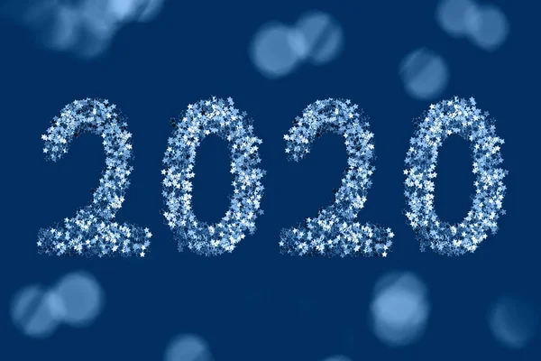 Blue stars sparkles shaped 2020 on dark background. — Stock Photo, Image