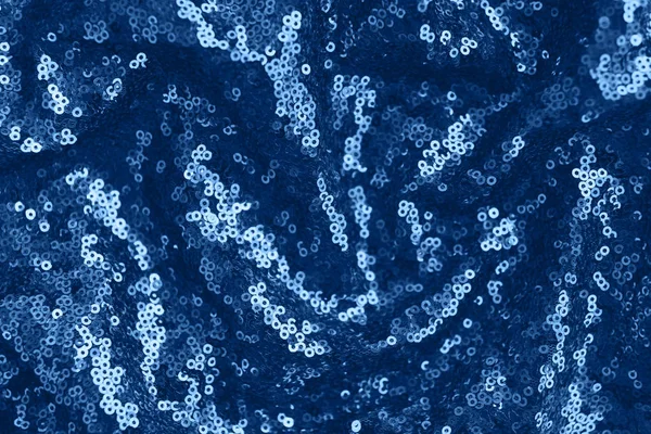 Festive shiny fabric with sequins, toned blue color. Abstract background. — Stock Photo, Image