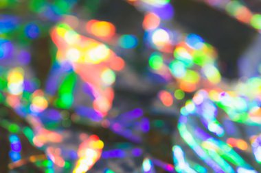 Bokeh gökkuşağı arkaplanı çok narin. Filmin yaratıcı ve karamsar rengi. Bulanık doku.