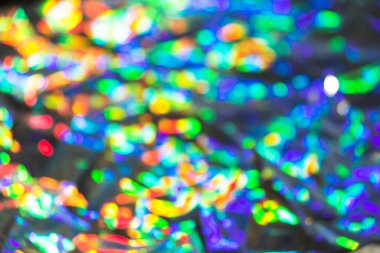 Bokeh gökkuşağı arkaplanı çok narin. Filmin yaratıcı ve karamsar rengi. Bulanık doku.