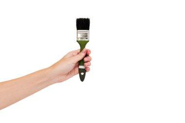 Eldeki boya fırçası beyaza izole edilmiş. Boyama kavramı.