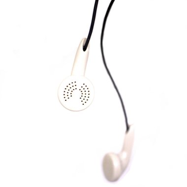 White headphones on a white background.Digital music concept.Close-up.
