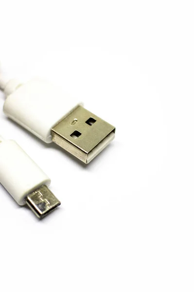 White micro USB cable BM, selective focus, close-up. — Stockfoto