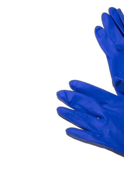 Голубые резиновые перчатки на белом фоне — стоковое фото