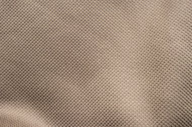 Dayanıklı su geçirmez kumaş. Ripstop kumaşı. Yakın çekim kahverengi ripstop malzeme dokusu ve arkaplan.