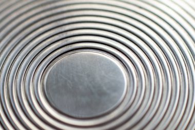 Yuvarlak bulanık metal dokusu. Metal daireler. Makro fotoğraf geometrik desen. Bulanık arkaplan veya doku.
