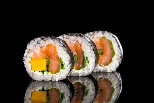 Суши на черном фоне — Лосось, рулон - Stock Photo | #195254810