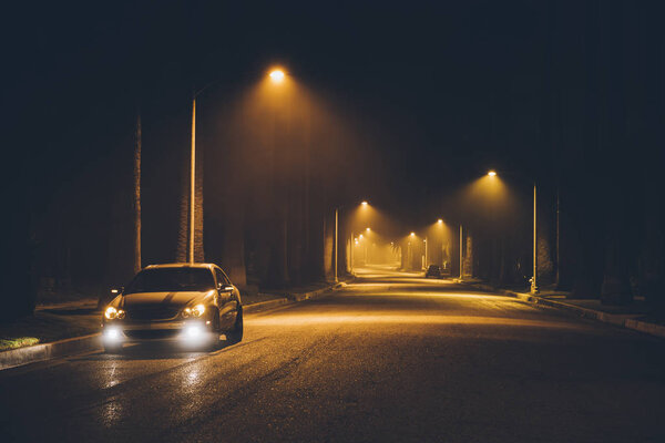 Night street in the fog. Car. Beverly Hills. Los Angeles. California. Nov 2017 Stock Photo