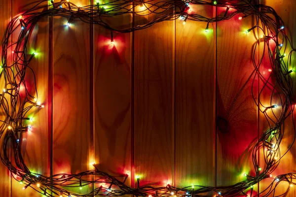 Χριστουγεννιάτικο Ξύλινο Πίνακα Φόντο Γιρλάντα Πάνω Άποψη — Φωτογραφία Αρχείου