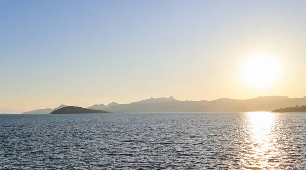 Beautiful sunset on the Mediterranean Sea with islands and mount — Stock Photo, Image