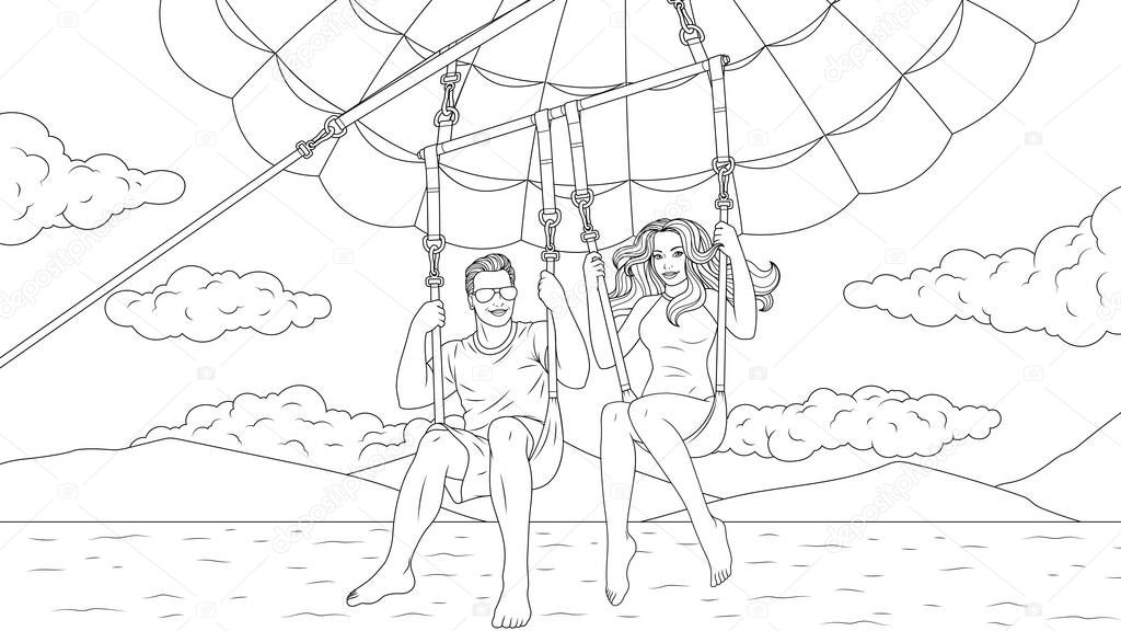 A young couple flies on a parachute