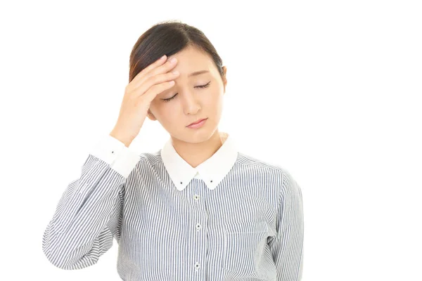 Affärskvinna med huvudvärk — Stockfoto