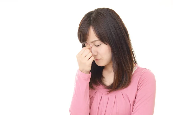 Woman who has a headache — Stock Photo, Image