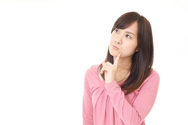 Uneasy Asian woman — Stock Photo, Image