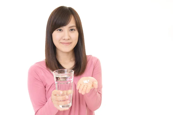 Woman with supplements — Stock Photo, Image